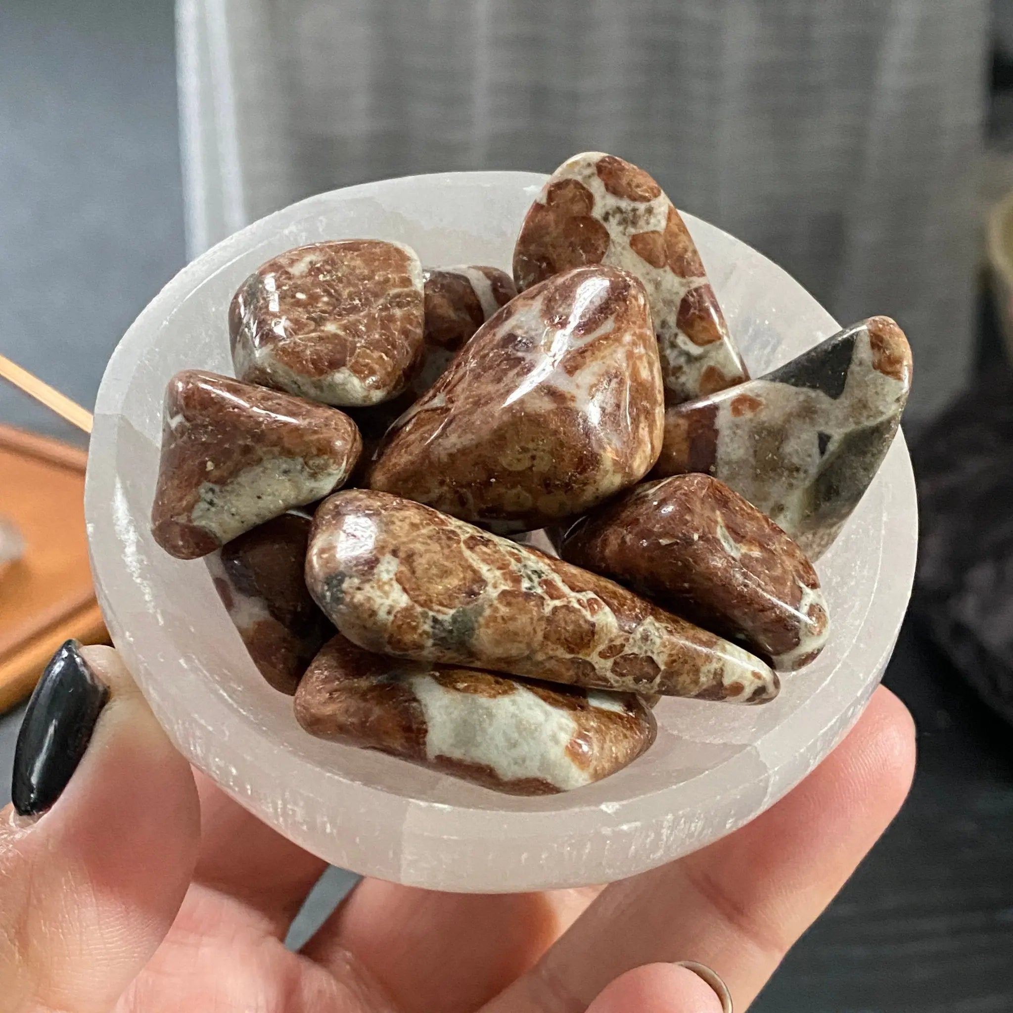 Spessartine Garnet in Matrix tumbled stones Castle Rocks Cornwall