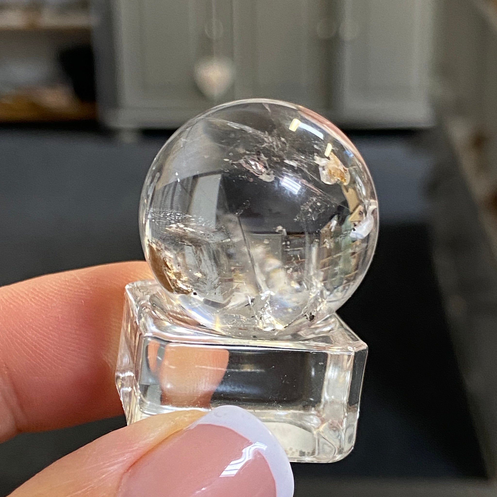 Clear Quartz Enhydro Sphere with Carbon Inclusions