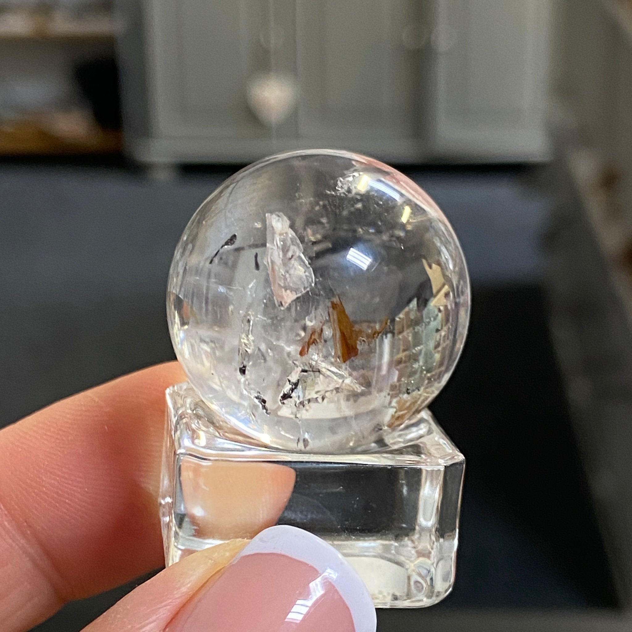 Clear Quartz Enhydro Sphere with Carbon Inclusions