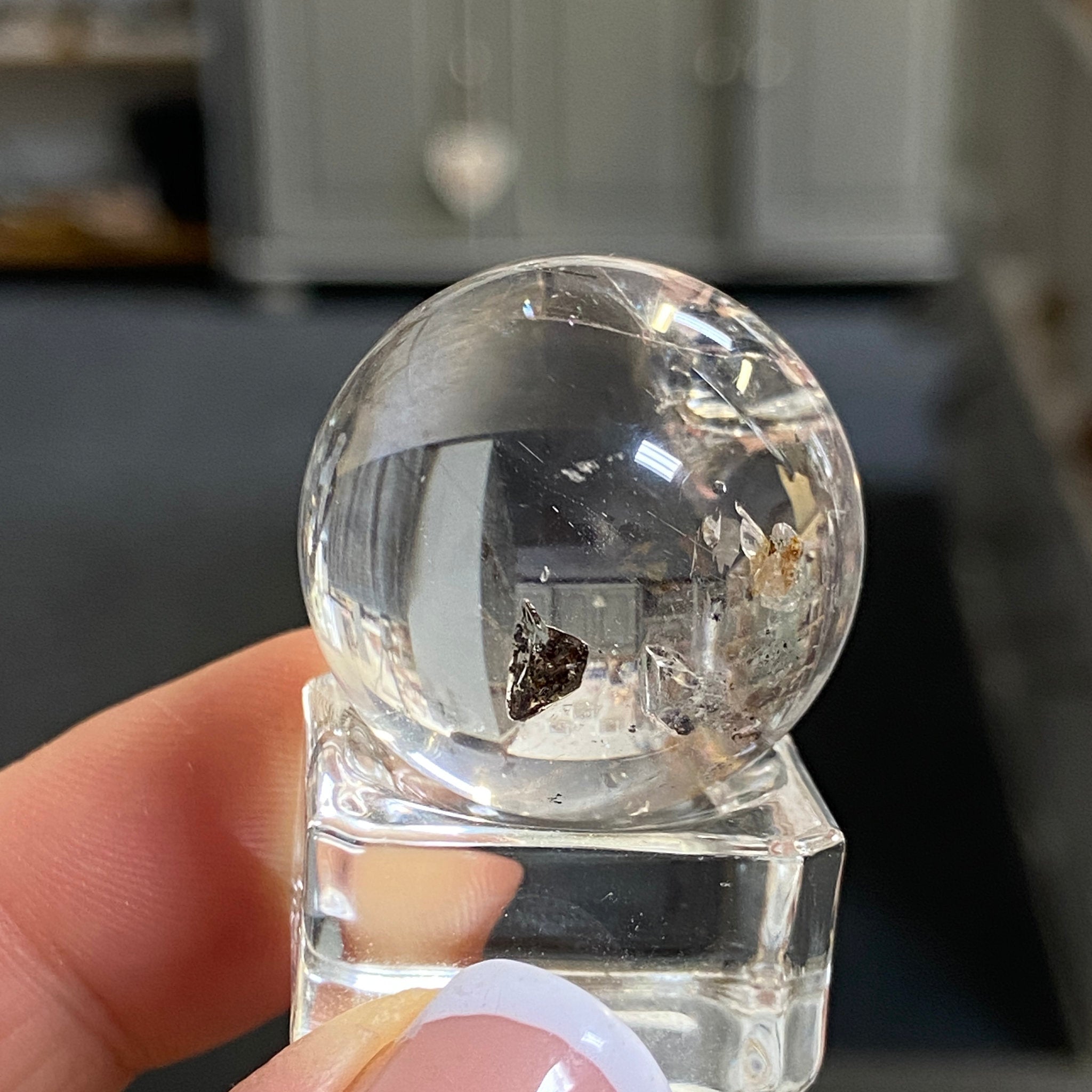 Clear Quartz Enhydro Sphere with Carbon Inclusions