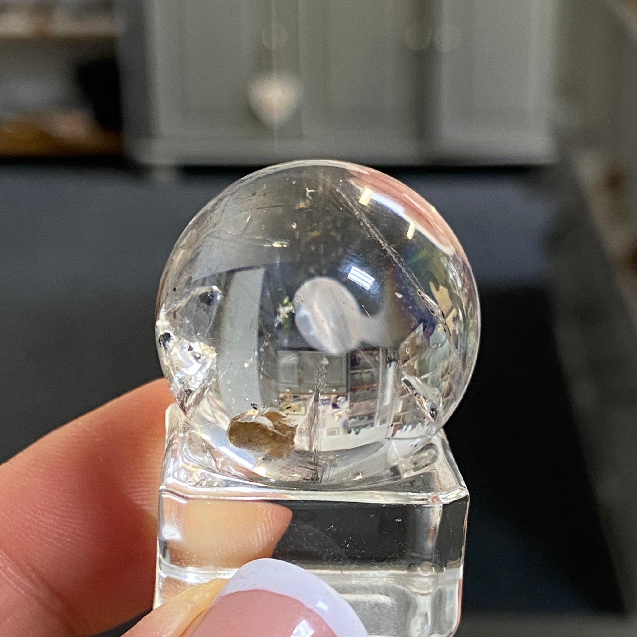Clear Quartz Enhydro Sphere with Carbon Inclusions