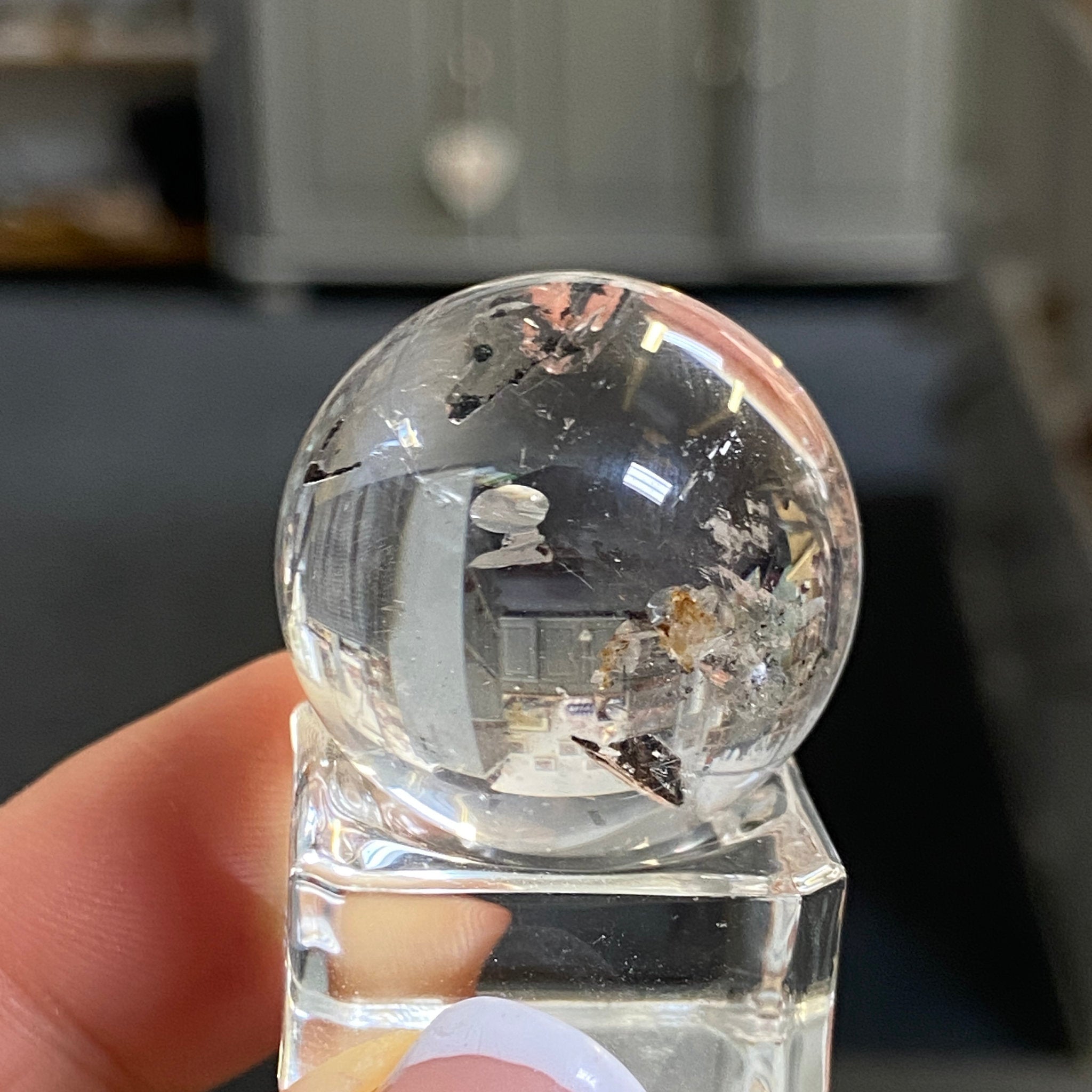 Clear Quartz Enhydro Sphere with Carbon Inclusions