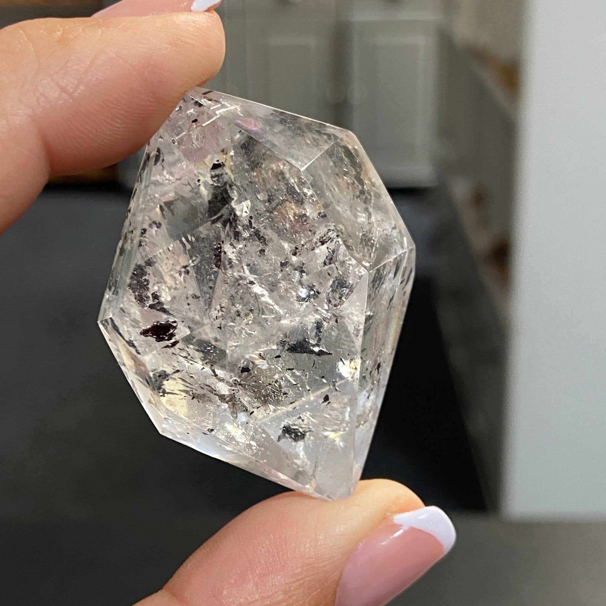 Double Terminated Enhydro Quartz with Falling Carbon Sand