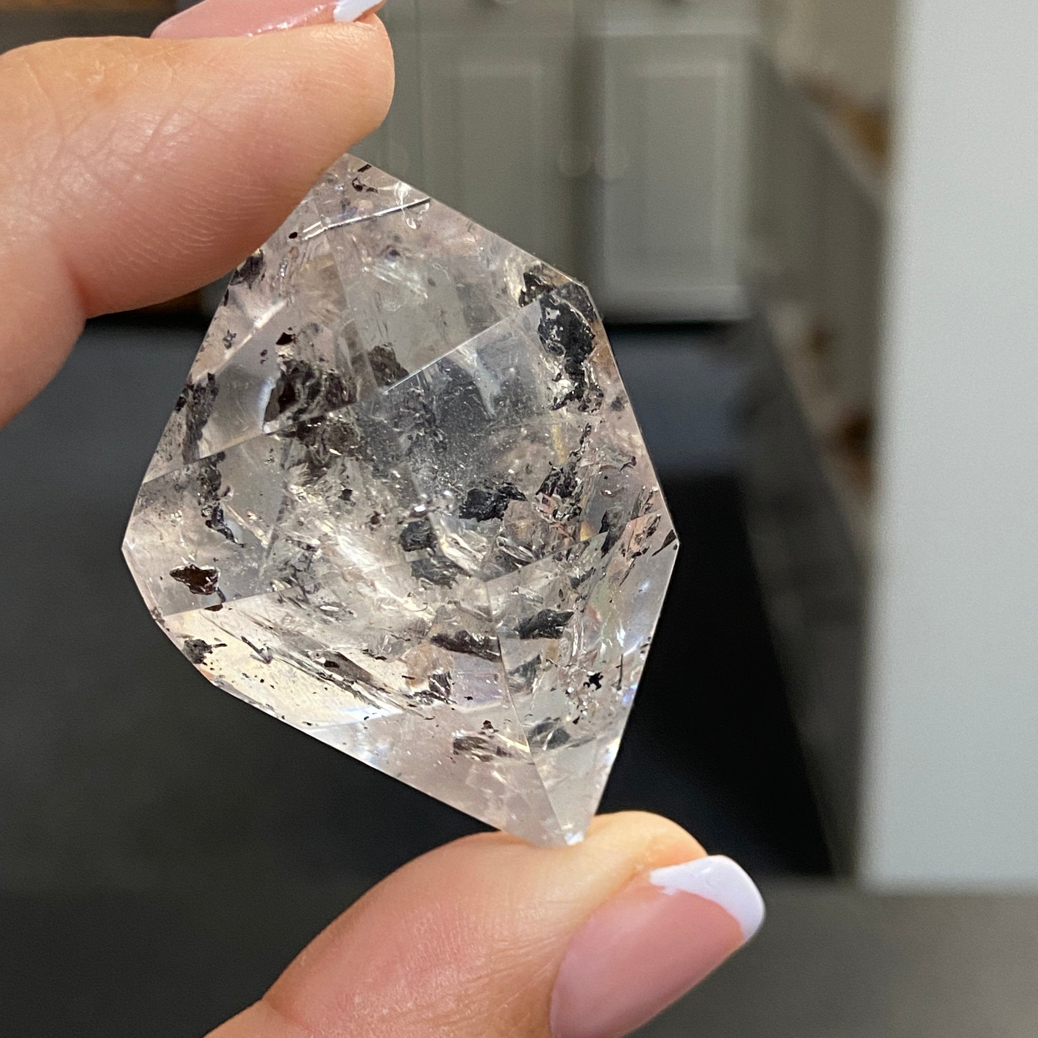 Double Terminated Enhydro Quartz with Falling Carbon Sand