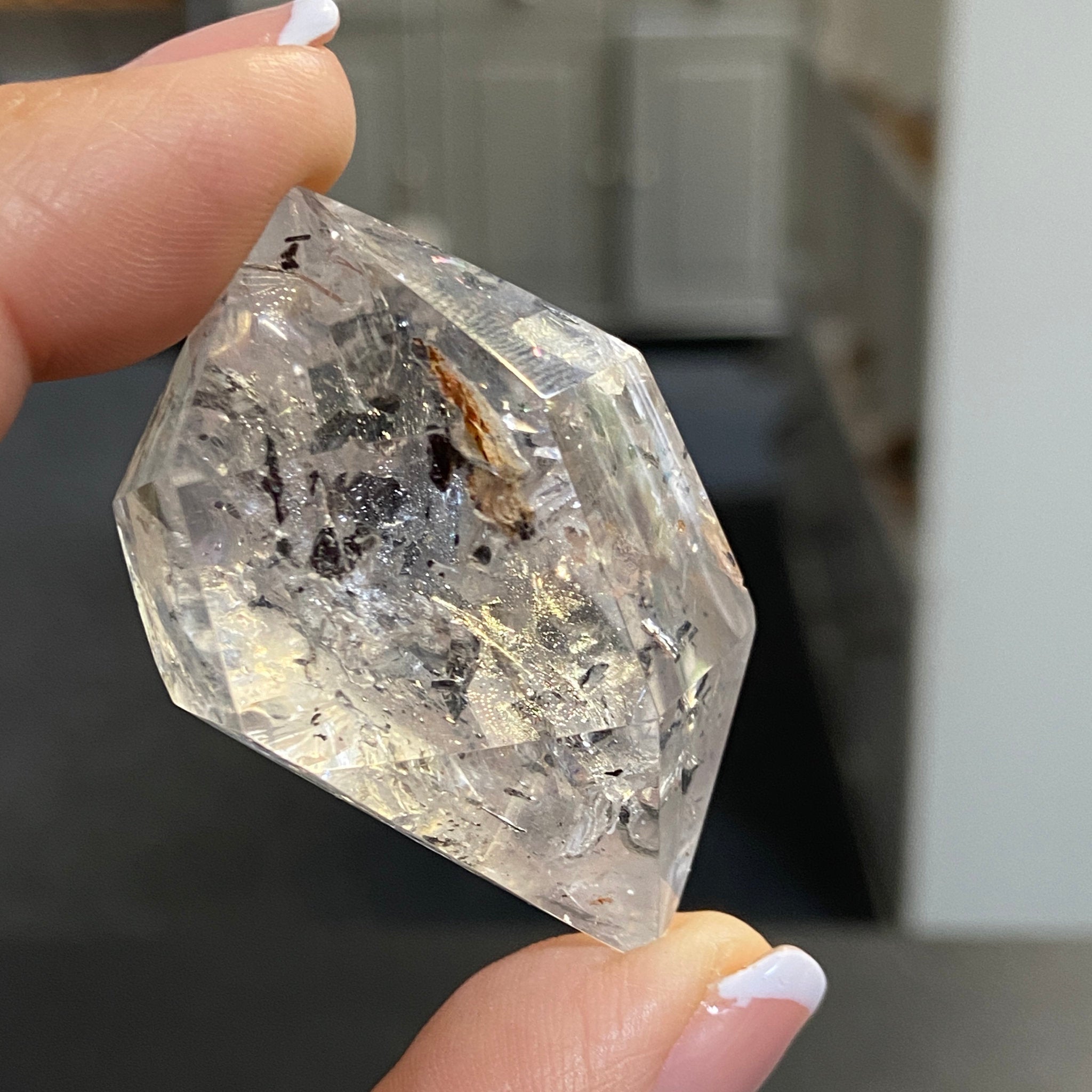 Double Terminated Enhydro Quartz with Falling Carbon Sand