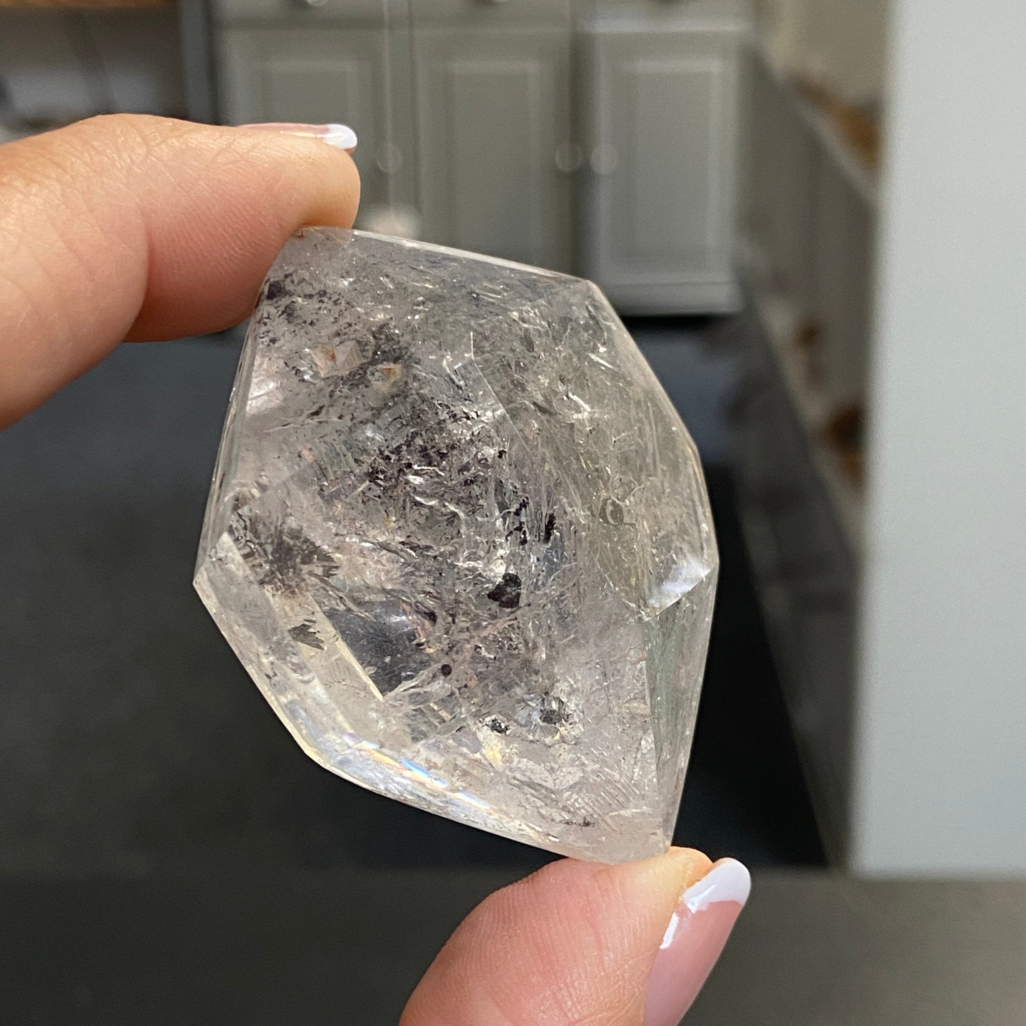 Double Terminated Enhydro Quartz with Falling Carbon Sand