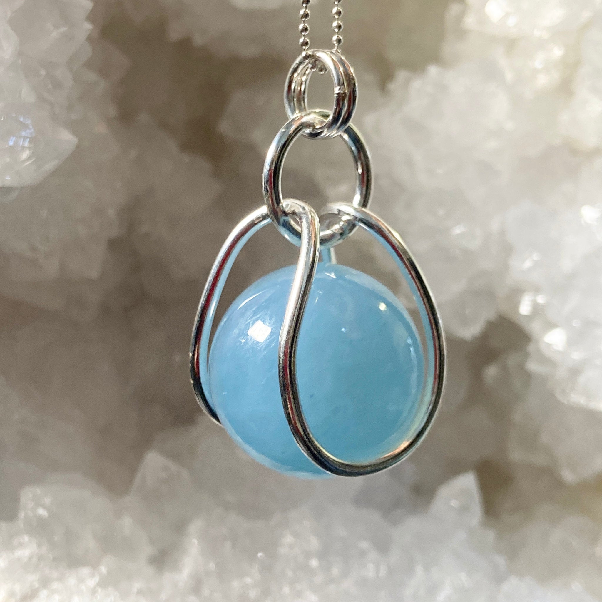 Aquamarine Sphere in Sterling Silver Cage - Bespoke by Song of the Sea - Castle Rocks Cornwall