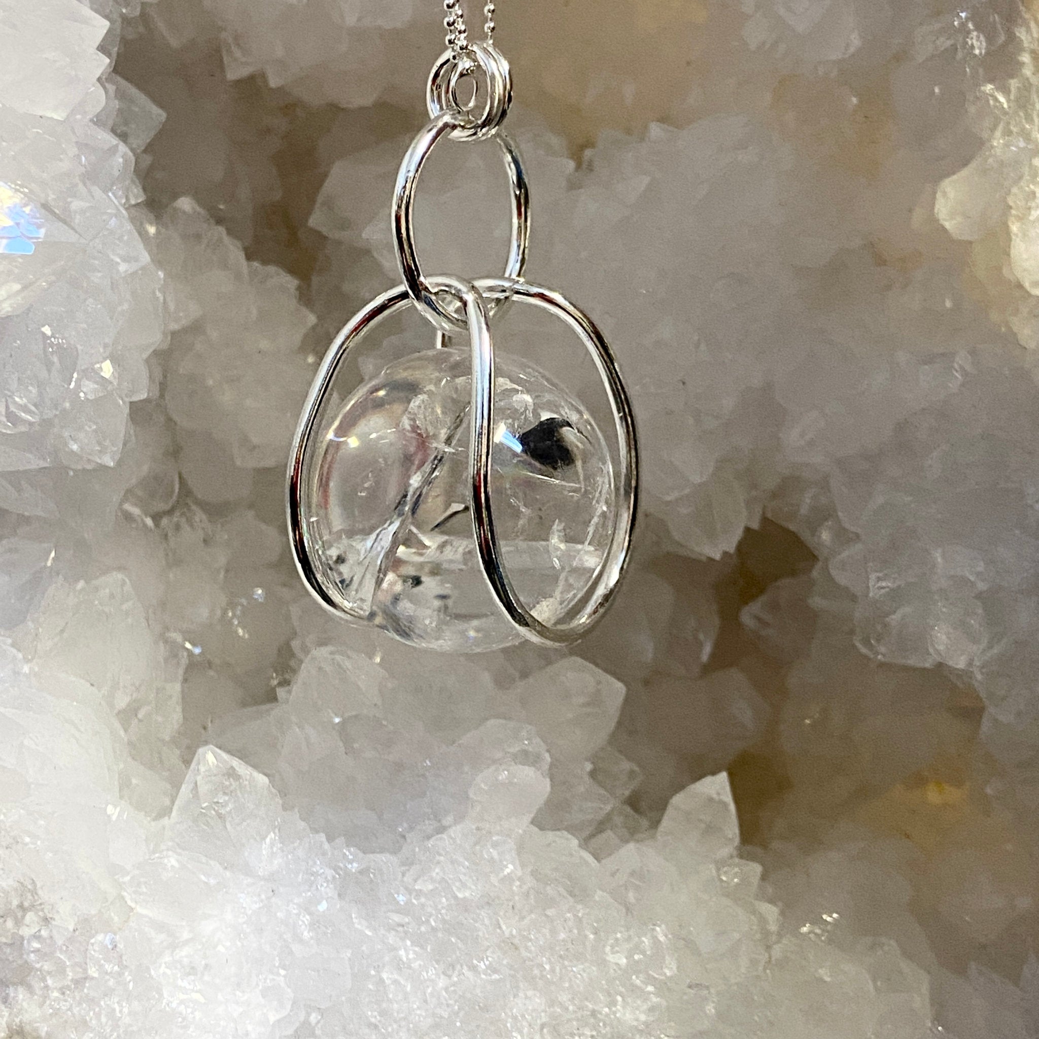 Clear Quartz Sphere in Moving Cage – Colombia - Bespoke by Song of the Sea - Castle Rocks Cornwall