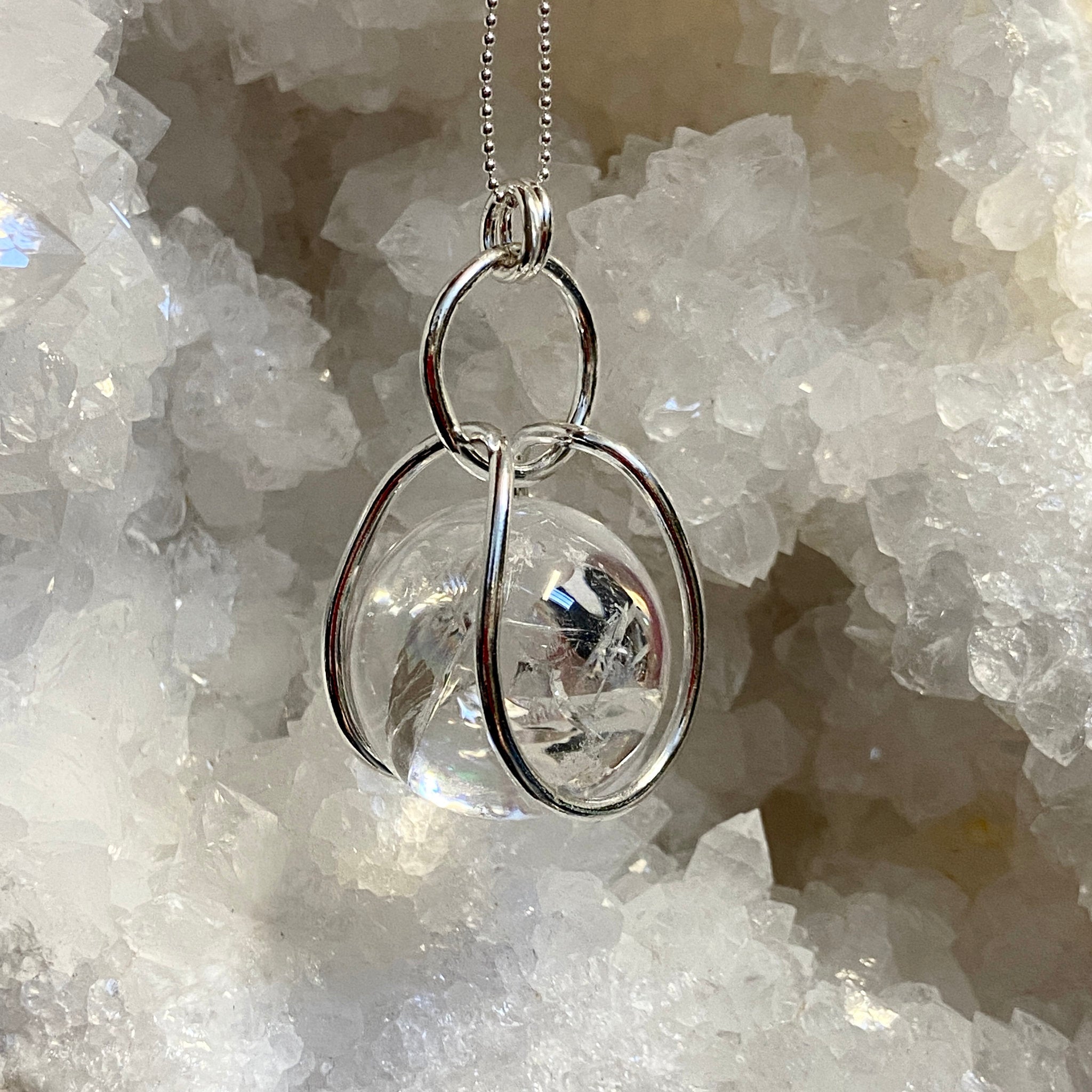 Clear Quartz Sphere in Moving Cage – Colombia - Bespoke by Song of the Sea - Castle Rocks Cornwall
