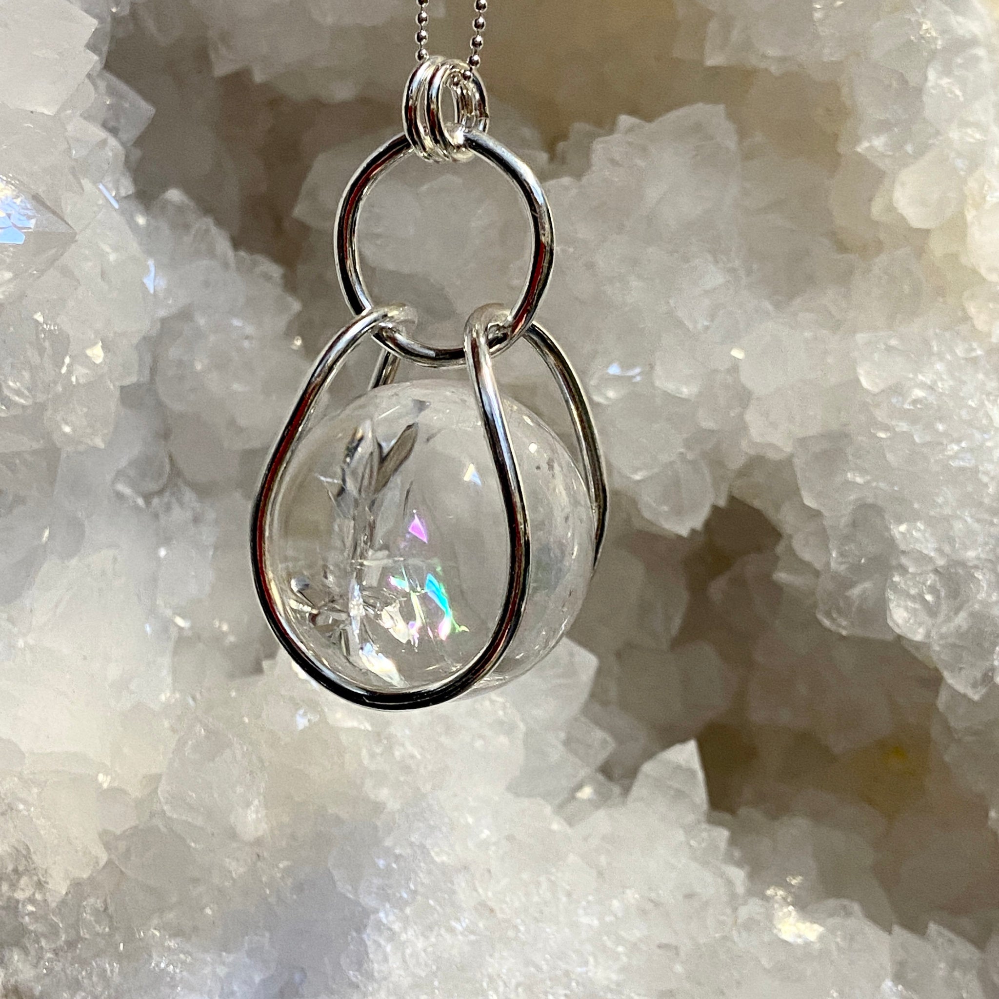 Clear Quartz Sphere in Moving Cage – Colombia - Bespoke by Song of the Sea - Castle Rocks Cornwall