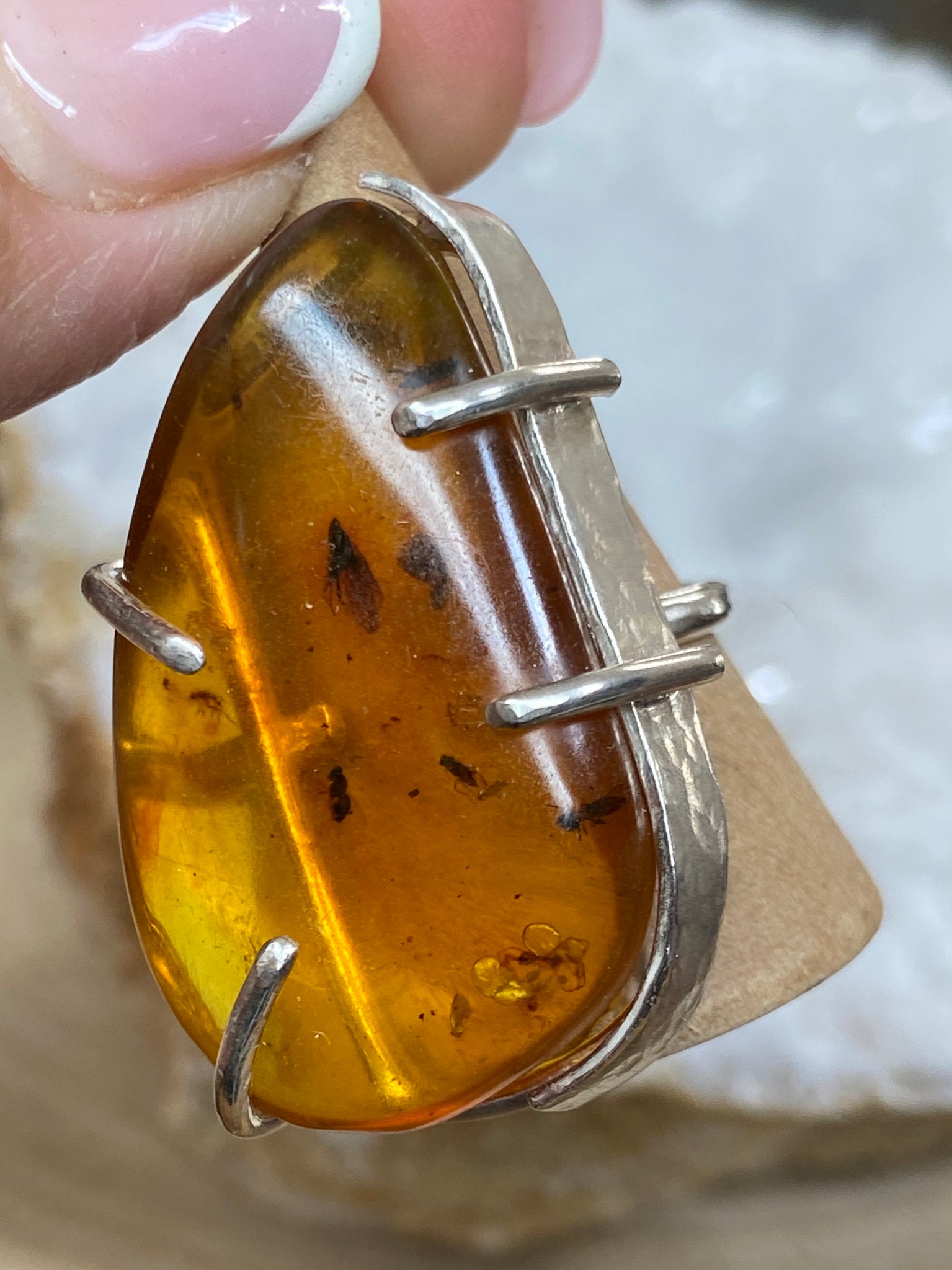 Bezelled Amber Ring with Prehistoric Inclusions – Bespoke by Song of the Sea