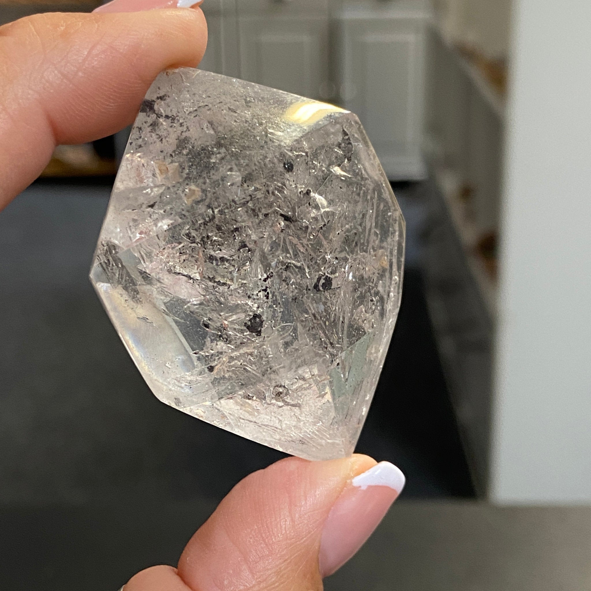 Double Terminated Enhydro Quartz with Falling Carbon Sand