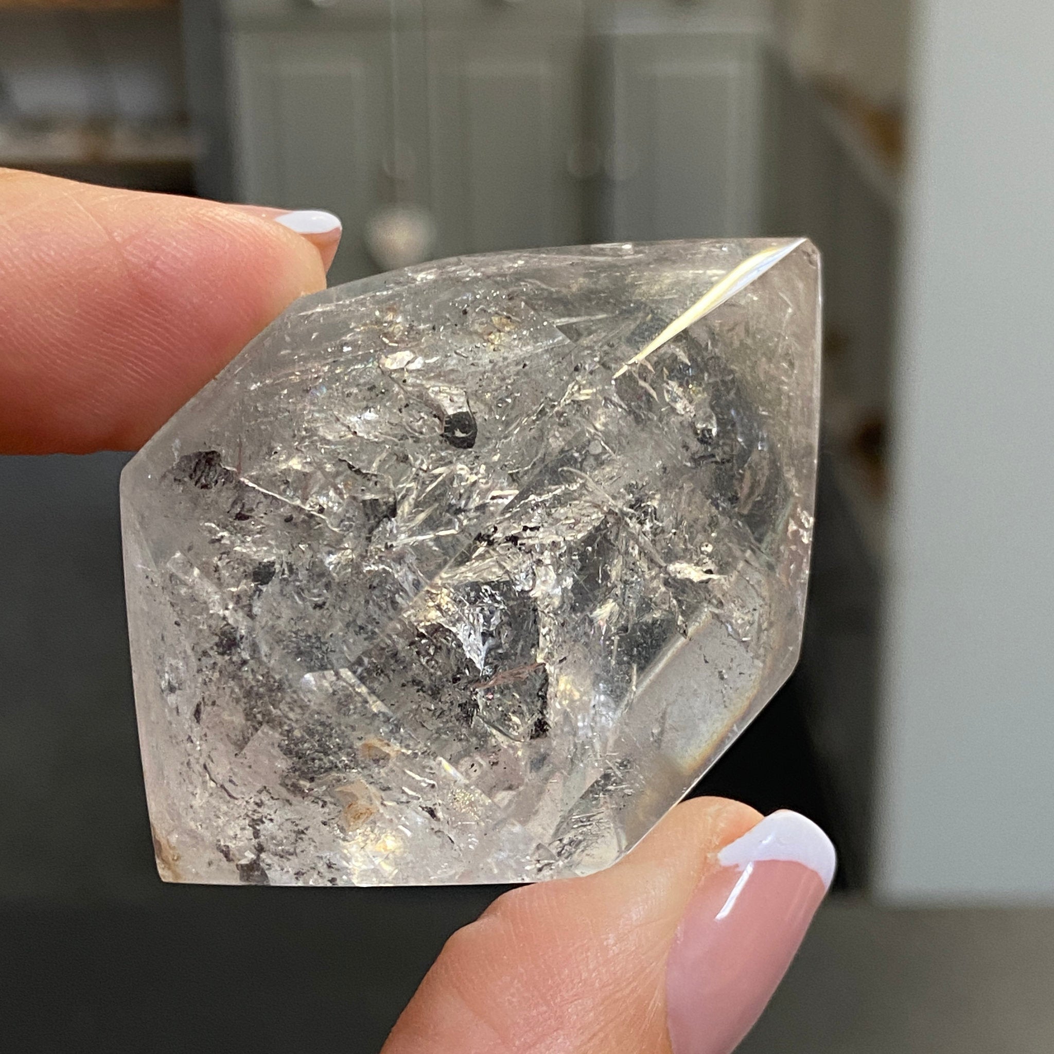 Double Terminated Enhydro Quartz with Falling Carbon Sand