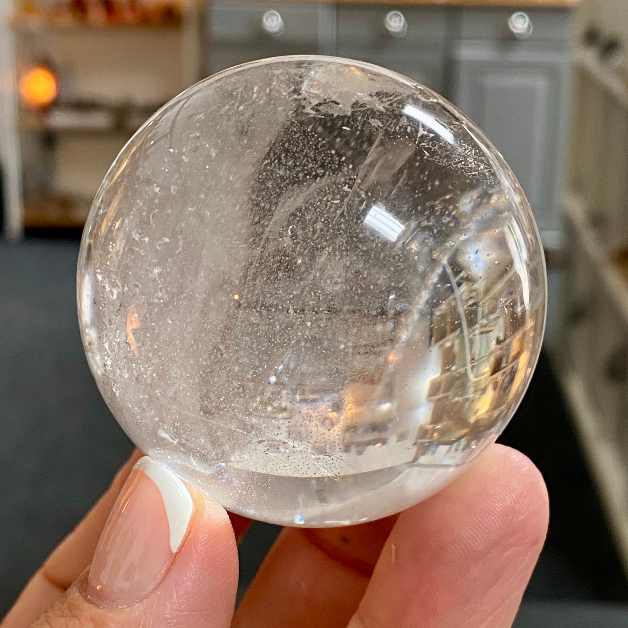 🤍 Delicate Smoky Quartz Sphere – River-Rolled, Madagascar