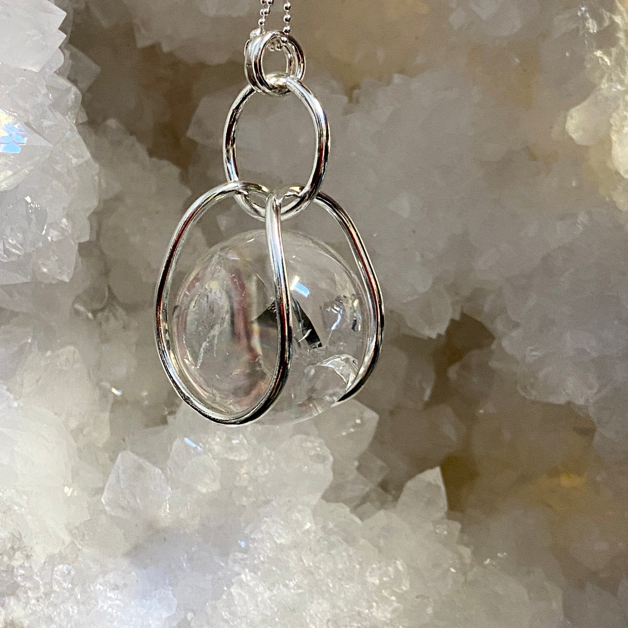 Clear Quartz Sphere in Moving Cage – Colombia - Bespoke by Song of the Sea - Castle Rocks Cornwall