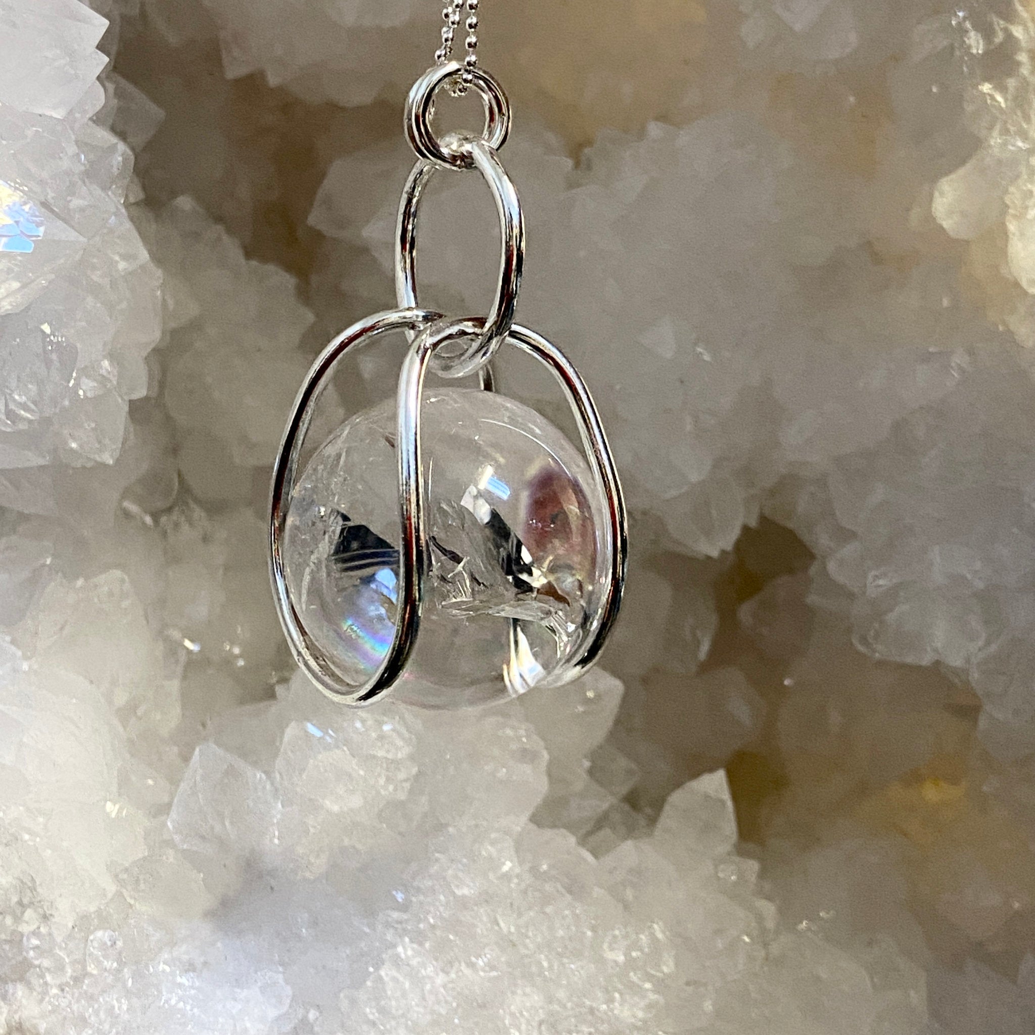 Clear Quartz Sphere in Moving Cage – Colombia - Bespoke by Song of the Sea - Castle Rocks Cornwall